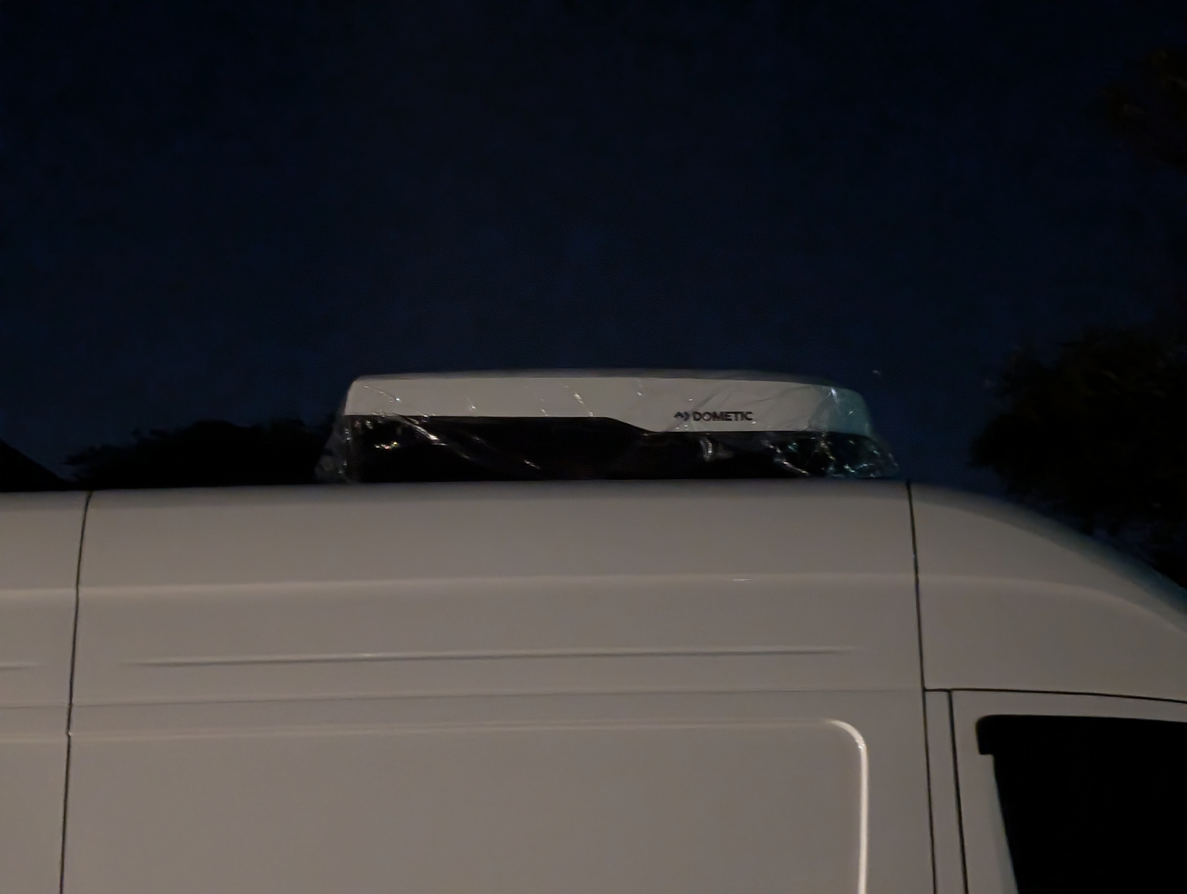 Rooftop air conditioner mounted on a campervan